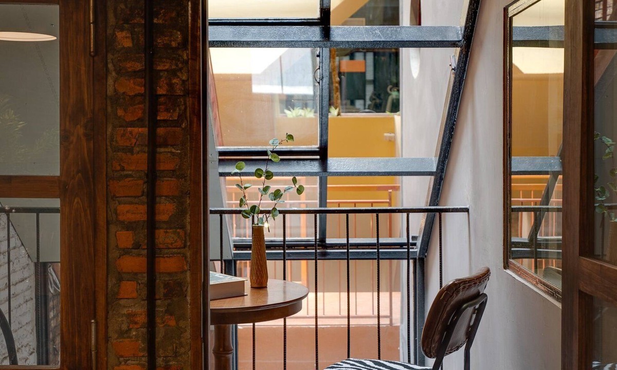 Downtown Ho Chi Minh City House | 4BR Industrial Gem with Rooftop Garden by Bến Thành