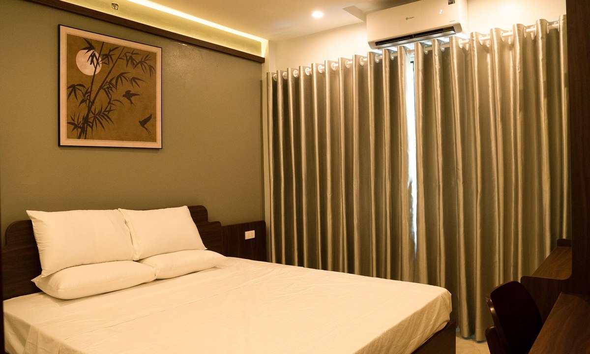 Hang Bac Apartment | Central Old Quarter 2BR | Street - facing room | Balcony | Elegance Home
