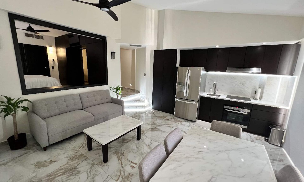 Flamingos Resort | Fully renovated top floor oceanfront condo.