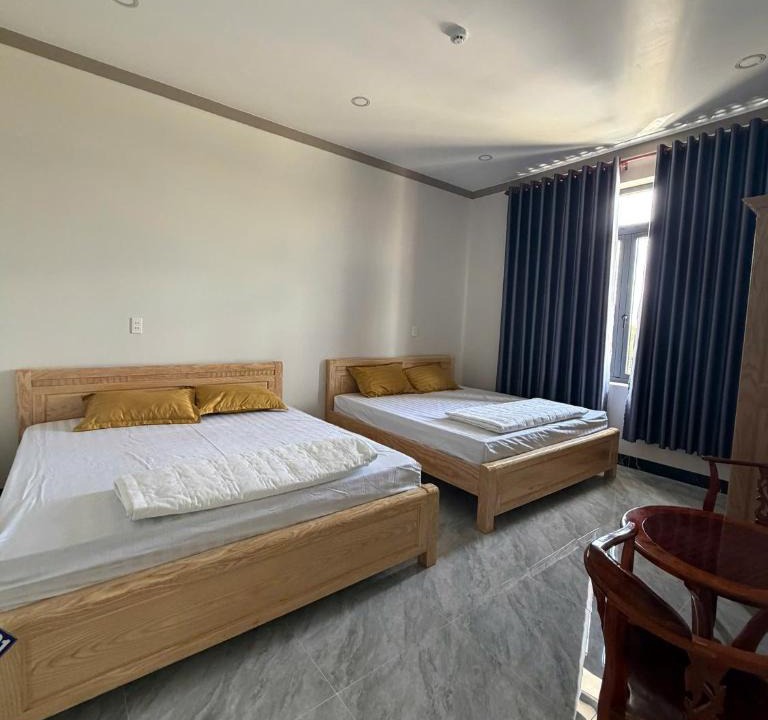 Tan Uyen Town Hotel | Nhà Nghỉ Hoa Mai