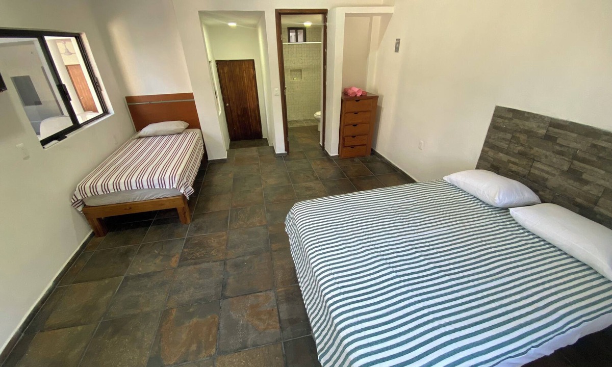 Los Ayala House | Very comfortable suite with 1 QS + 1 twin bed, AC. Only 2 blocks from beach.