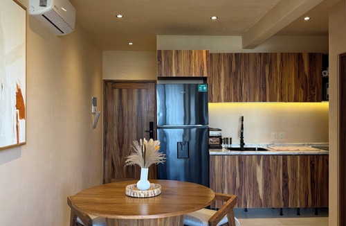 Ejidal Apartment | 10 min. from beach, New luxury condo w/Pool, Gym, Sauna, Parking and laundry!