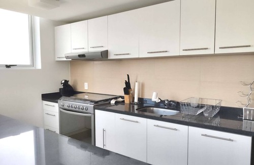 Anahuac Condo | Aurora · Panoramic view, pool and gym · 2 baths