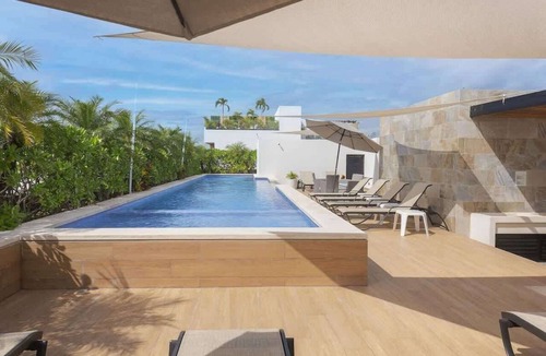 Gonzalo Guerrero Condo | Beachfront Condo w/Rooftop Pool & Fast WiFi