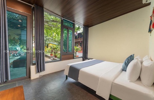 Tran Chau House | Catba Papillon Garden Bungalows & Resort