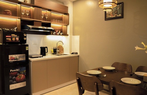 Hang Bac Apartment | Central Old Quarter 2BR | Street - facing room | Balcony | Elegance Home