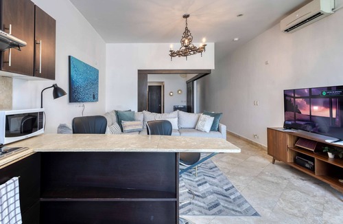 Libertad Apartment | Charming & sunlit condo with pool & balcony - near golf, beaches, & nightlife