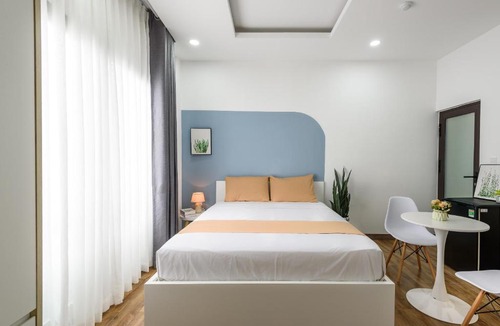 District 10 Apartment | Cozrum Homes - Summer's House