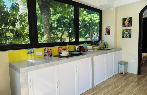 Lao Cai Apartment | Cozy Haven Nest – Sunlit Glass & Green Views