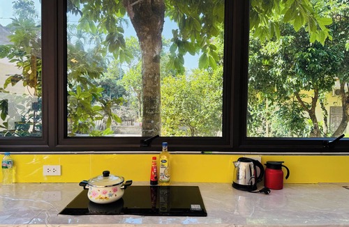 Lao Cai Apartment | Cozy Haven Nest – Sunlit Glass & Green Views