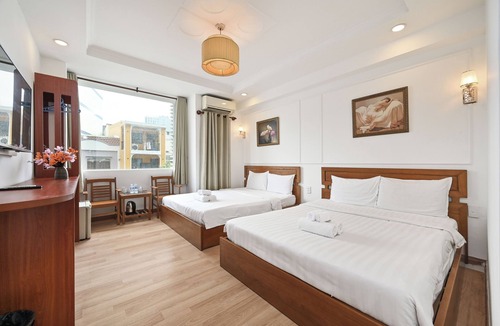 District 1 Hotel | Deluxe Family Room with City View