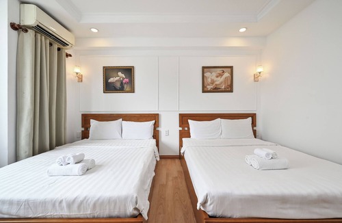 District 1 Hotel | Deluxe Family Room with City View