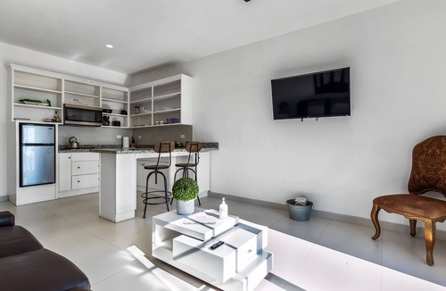 La Paloma Apartment | Dog-friendly suite with kitchenette, heated outdoor pool, hot tub, private patio