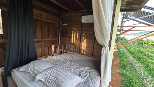 Phuoc Long House | Em Cá Gỗ Farmstay