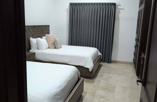 Juarez Villa | Fabulous 2-bedroom villa with AC located inside Los Cabo’s golf resort.