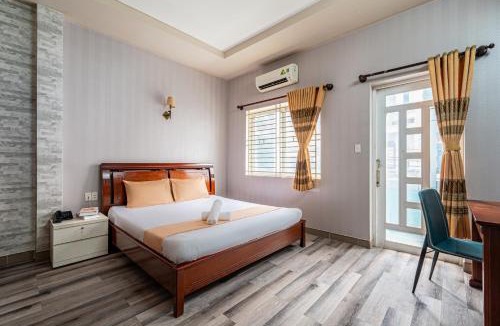 District 10 Hotel | Hoàng Long Hotel By Cozrum
