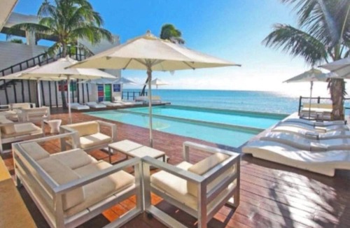 Puerto Juarez Condo | Hospedaje perfecto para tu grupo beachclub & Golf