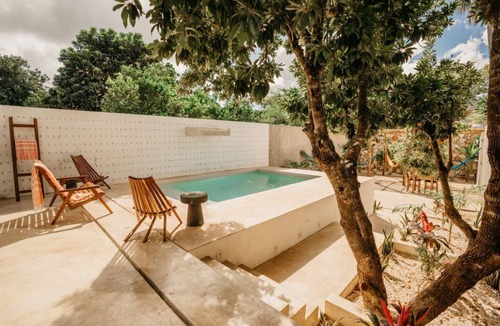 Valladolid House | Luxe Oasis w/private pool, waterfall, yoga & hammock garden. Sleeps 12. Walk Downtown.