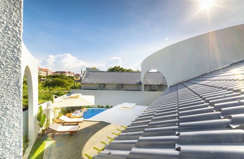 Tho Quang Beach Villa | Minimalist-style private villa with unique arched gatewat design & private pool