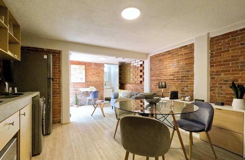 Del Carmen Apartment | Modern brick retreat in Coyoacán | Patio