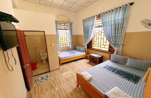 Van Ninh Hotel | Nhà Nghỉ Hoa Lan