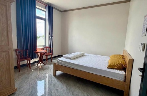 Tan Uyen Town Hotel | Nhà Nghỉ Hoa Mai