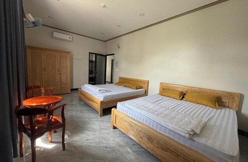 Tan Uyen Town Hotel | Nhà Nghỉ Hoa Mai