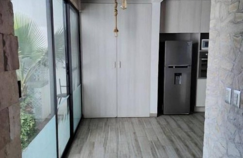 Queretaro Apartment | Spacious ground-floor apartment with an indoor fireplace.