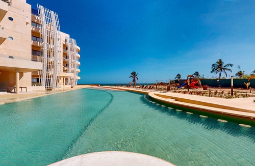 Telchac Puerto Apartment | Stunning oceanfront retreat with a pool and great views, perfect for families