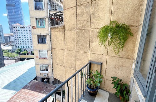 Dong Khoi Apartment | The Cafe Apartments Building - Deluxe King room has a Nice Balcony