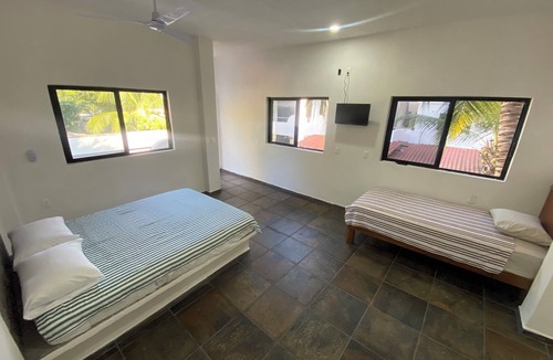 Los Ayala House | Very comfortable suite with 1 QS + 1 twin bed, AC. Only 2 blocks from beach.
