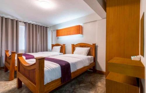 Chana Songkhram Apartment | XX GO INN Bangkok Khaosan Road - โก อินน์ ถนน ข้าวสาร กรุงเทพ