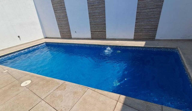 Charming 3-bedroom house in Cocoyoc, with 3 bathrooms, AC ,pool, grill in YAUTEPEC