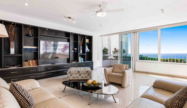 Elegant multi-level penthouse with rooftop Jacuzzi, bay views, pool & game room in Puerto Vallarta