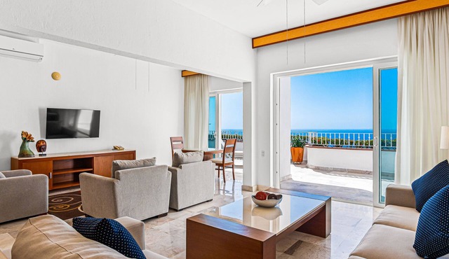 Elegant oceanview suite with heated pool, private hot tub & terrace dining in Puerto Vallarta