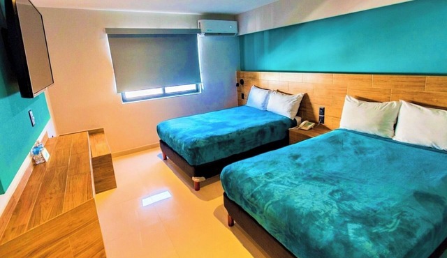 Group Stay Made Easy with Four Fresh Rooms Near Sábalo Beach & Nightlife in Mazatlán