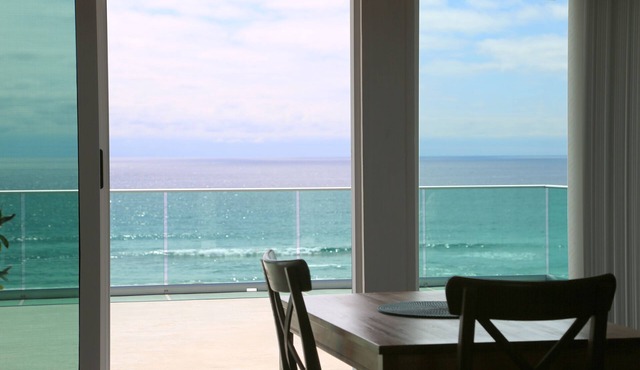 Large beachfront loft apartment in gated community Playa La Misión with deck. in Playa La Misión