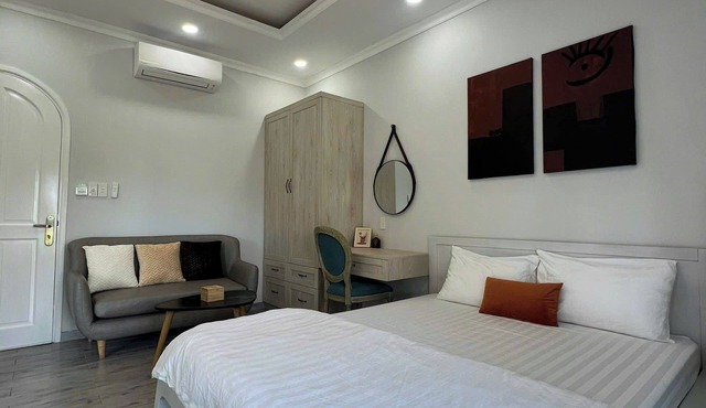 Soc Nhim Homestay Grandworld Phu QuocnRoom 101 Triple Balcony Beach