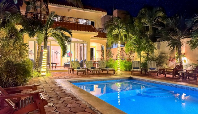 Spacious Hacienda style home with charming garden, screened porch and pool in Puerto Morelos