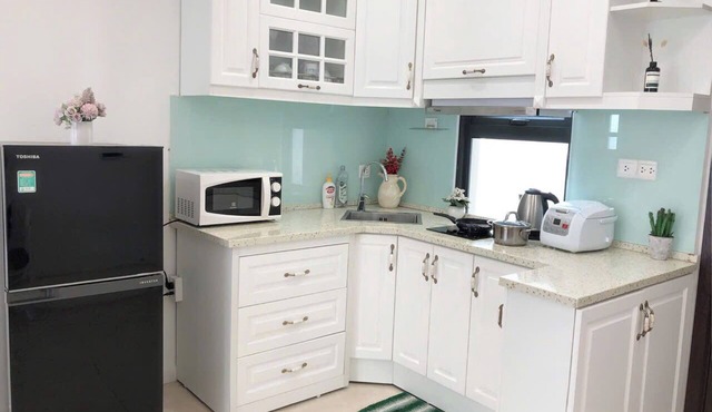 Stylish 1BR at D’Capitale | Central, Cozy, City Views
