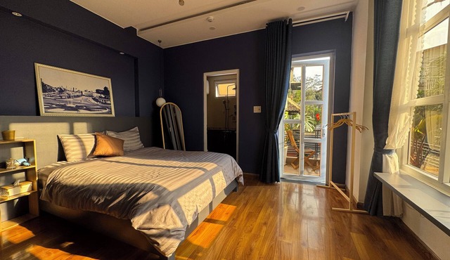 Sunny doubled-balcony hotel suites in the spacious and cozy villa