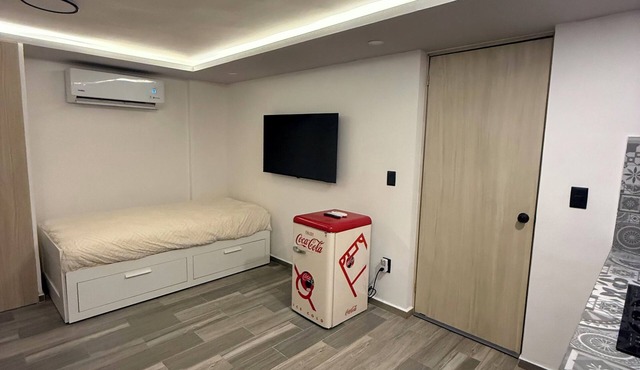 Tranquil 1-bedroom hotel suites with AC in Gro, 2 pools and Jacuzzy in Gro.
