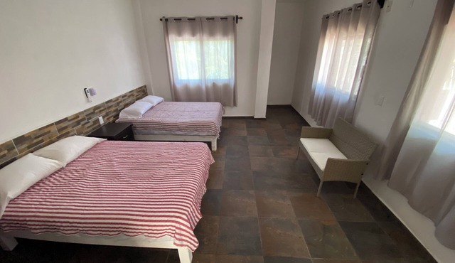 Very comfortable suite with 2 dbl beds, terrace and AC. Only 2 blocks from beach in Los Ayala