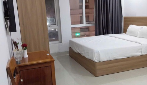 Deluxe Quadruple Room, City View