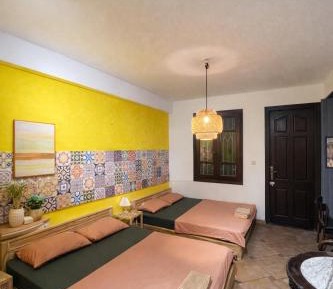 Quadruple Room with Private Bathroom