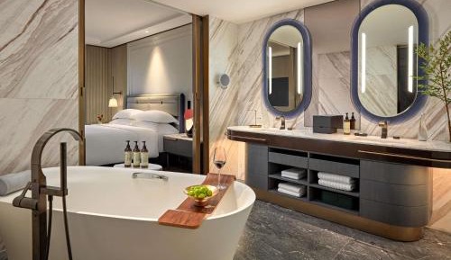 Two-Bedroom Premier Suite King and Two Single Beds - Separate Living Space