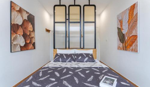 One-Bedroom Apartment with Balcony and City View
