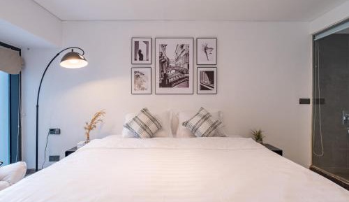 One-Bedroom Apartment with Balcony and City View