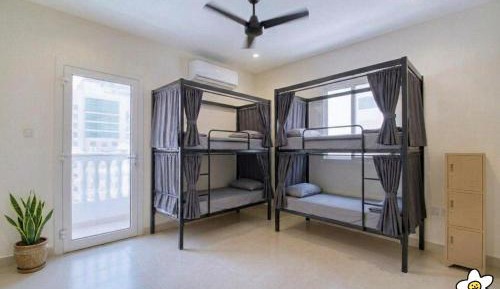 Single Bed in Dormitory Room