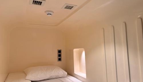 Single Bed in Dormitory Room